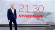mand poserer i nyhedsstudie