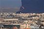 Røg stiger op fra et oliedepot i den saudiarabiske by Jeddah