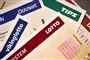 lotto, oddset og tipskuponer ligger på bord