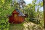 lille sommerhus i skov