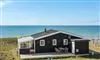 Et sommerhus ved vandet