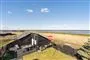 Et sommerhus ved vandet
