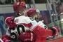 ishockeyspillere jubler på isen