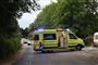 ambulance holder på vej