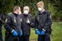 politifolk med masker