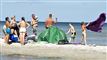 Mennesker på strand