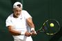 tennisspiller i aktion