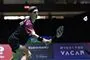 badmintonspiller i aktion