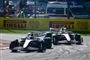 Racebiler i overhaling