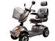 En elscooter i champagnelak