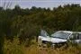 En hvid Audi i grøften