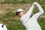golfspiller laver et sving