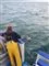 mand reddes fra havet