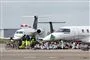 aktivister sidder på landingsbane
