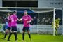 fodboldspillere i lilla dragt