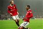 to fodboldspillere i aktion - fra manchester united
