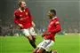to fodboldspillere i aktion - fra manchester united