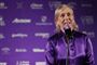 Marina Navratilova med en lilla skjorte