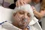 indbundet hoved i hospitalsseng