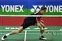 badmintonspiller i aktion