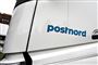Postnords logo på en lastbil