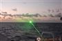En laserstråle på havet