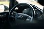 En Ford indefra man ser mest rattet