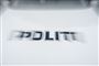 Politibil med utydelig skrift