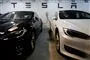 to tesla-biler lades op