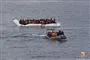 To gummibåde med migranter