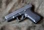 pistol på klæde 