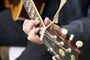 person spiller guitar