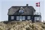 sommerhus med dansk flag 