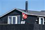Et sommerhus lige ud til vandet
