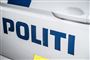 siden af en politibil.