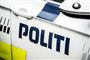 Siden af en politibil 