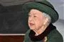 Dronning Elizabeth med en mørkegrøn hat på.
