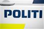 Siden af en politibil 