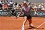tennisspiller på banen
