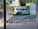 politibil holder ved tankanlæg