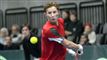 en tennisspiller i aktion