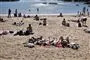 folk på strand