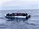 En gummibåd med migranter