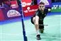 badmintonspiller i aktion