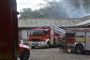 Brandmænd på en gård