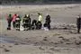 Reddere på en strand