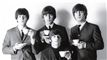 et sort-hvd billede af The Beatles