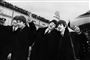 et sort-hvd billede af The Beatles