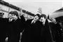 et sort-hvd billede af The Beatles
