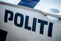 Siden af en politibil 